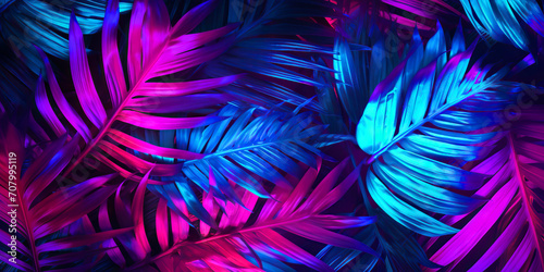 Background with tinted pink and blue palm leaves photo