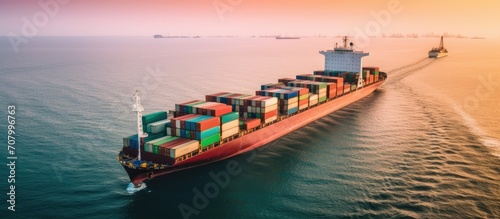 The ship carries a full load of container goods. concept of export import logistics, shipping and transportation.
