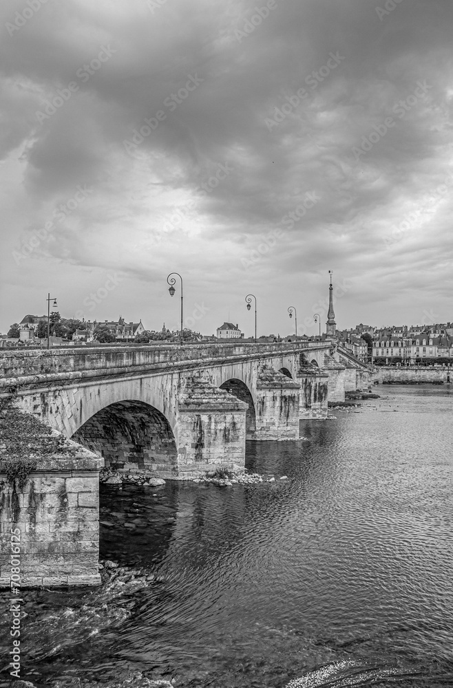 Fototapeta premium Old historical buildings in the narrow street at ancient city Blois France