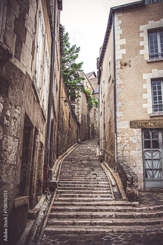 Fototapeta Naklejka Na Ścianę i Meble -  Old historical buildings in the narrow street at ancient city Blois  France