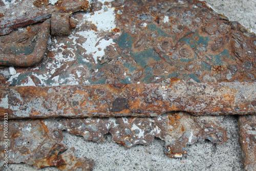 Corroded and damaged metal plates photo