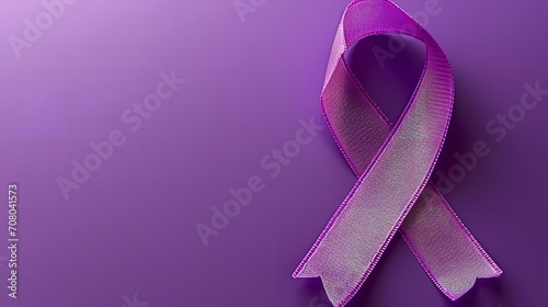 Purple Ribbon on Pastel Paper Background photo