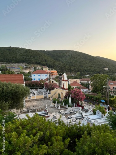 Fiskardo village at sunset time, Kefalonia Island, Greece. Greek Island architecture and yacht harbour