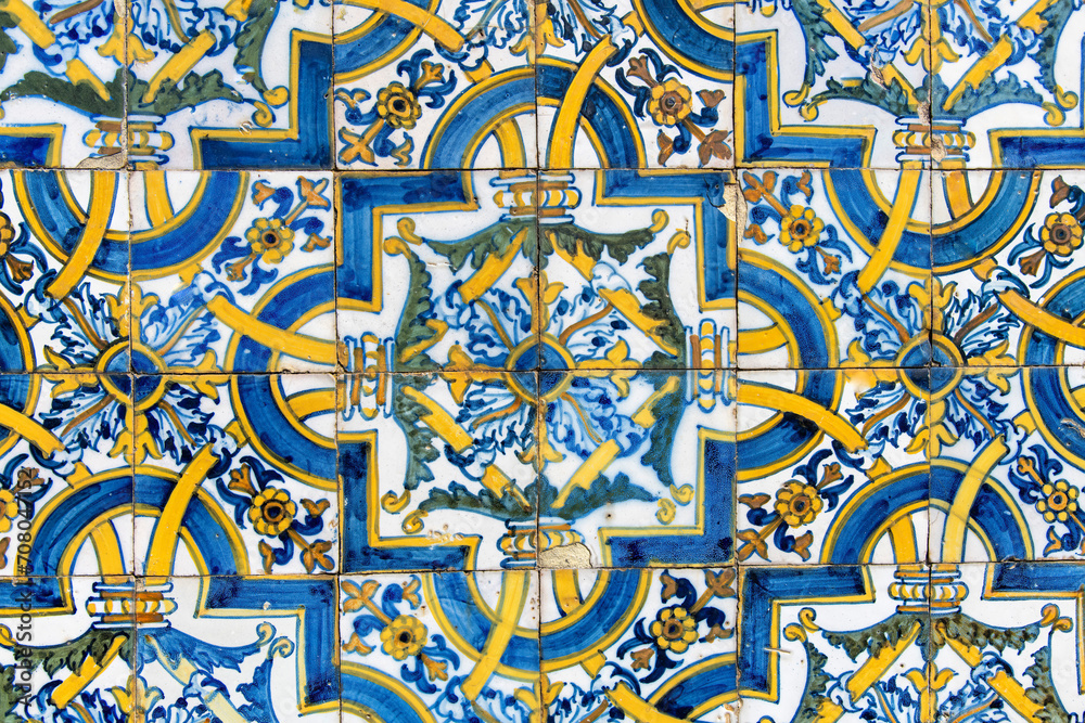 Close up of traditional glazed blue ceramic tiles or azulejos in Portugal
