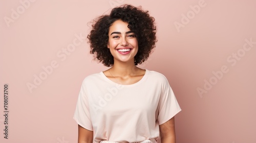 Young middle eastern woman standing over isolated background happy face smiling photo