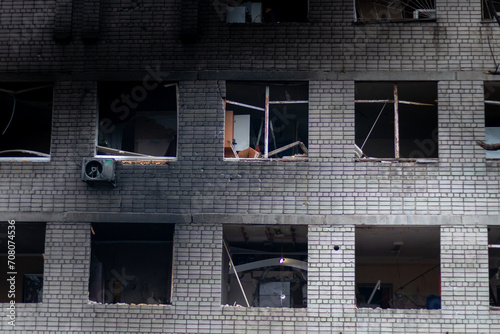 DNEPR, UKRAINE – January 07, 2024 Consequences of a kamikaze drone explosion in a house. Rocket attack on a hostel in the city of Dnepr. The interior of the house after the explosion. Burnt cars.  © Sergey