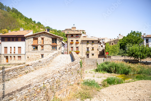 Bild auf Leinwand Roman bridge over Elorz river in Monreal (Elo) village, Navarra, Spain