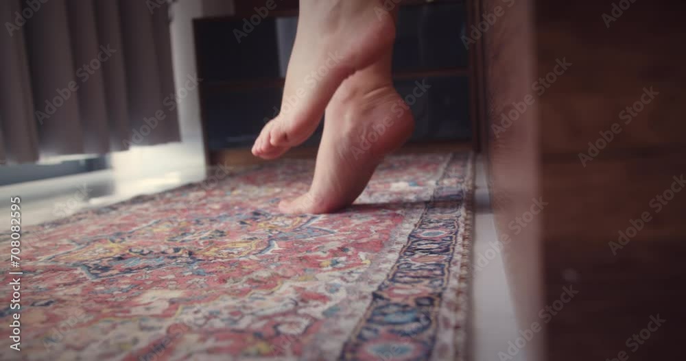 close-up shooting. legs of a pretty girl getting out of bed against the window. light background, morning wakes up. white bed beautiful female toes. go on the floor. parquet or laminate. fitness legs. close-up shooting. legs of a pretty girl getting out of bed against the window. light background, morning wakes up. white bed beautiful female toes. go on the floor. parquet or laminate. fitness legs.
