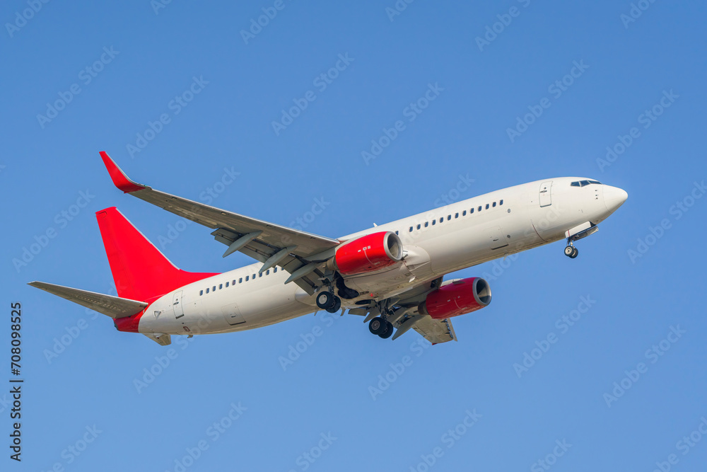 Turkey - Antalya 11,04,2023: Corendon Airlines passenger plane lands at Antalya airport. Turkey - Antalya 11,04,2023: Corendon Airlines passenger plane lands at Antalya airport.