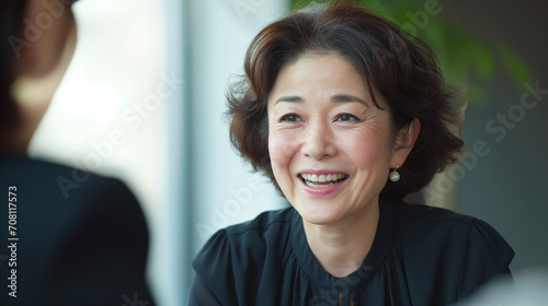 Japanese Businesswoman in Job Interview: Candid Meeting, Recruitment Talk, Manager and Candidate Discussion, Happy HR Management Interaction, Middle Aged Professional Negotiation, Business People Enga