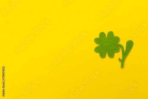 Felt clover leaves on color background, top view. St. Patricks day concept