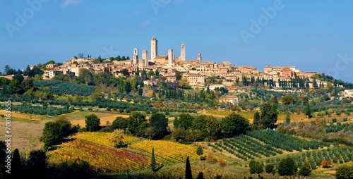 town view, town scape, cityscape of San Gimignano in autumn, gender tower, countryside, in fall, fields of olive trees, wineyard, Tuscany, Italy, Europe