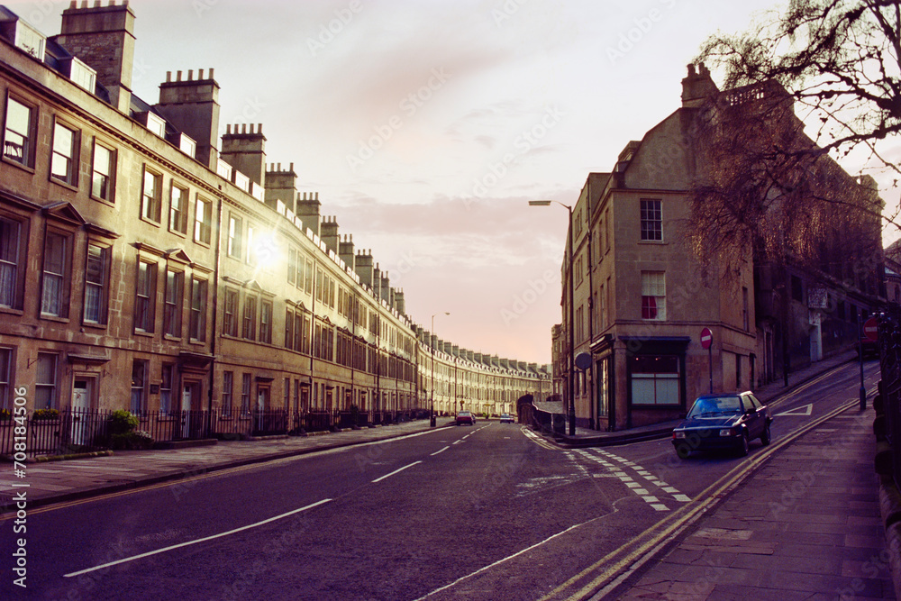 Grainy 1990 film photograph of row houses along the Paragon at Guiena Ave in historic Bath England.  