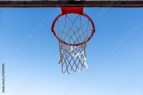 A metal basketball basket of the typical orange © Toyakisfoto.photos