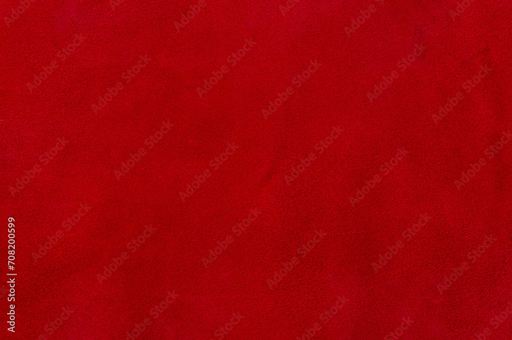 Red suede texture. Natural red dyed leather, suede macro photo. Red suede texture. Natural red dyed leather, suede macro photo.