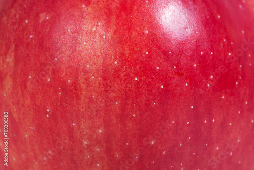 The texture of a delicious fresh apple as a background. Apple as a material for a designer. photo