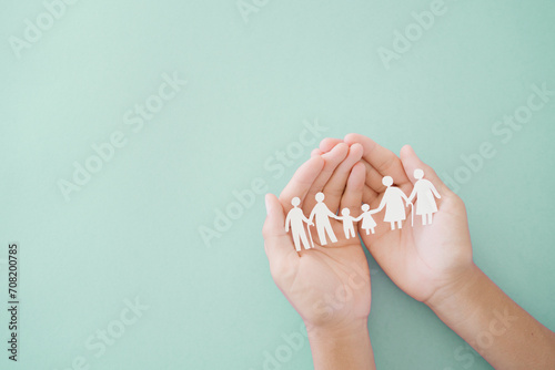 Hands holding diversity family, happy carer and volunteer, disable nursing home, rehabilitation and health insurance concept