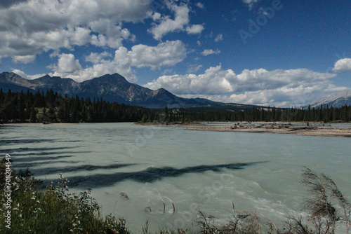 Athabasca river with mountains towering over