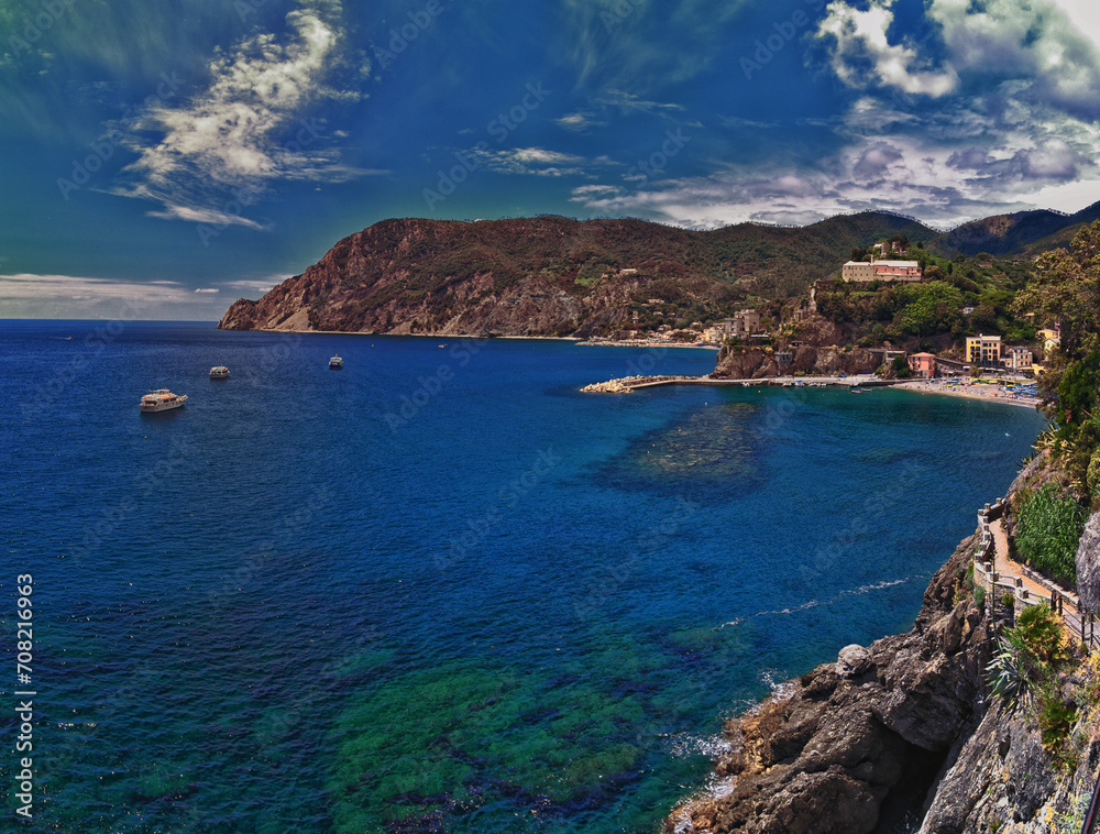 Fototapeta premium Cinque Terre Mediterranean Sea views along town hiking trail Italian Riviera coastline. Liguria, Italy, Europe. 2023 Summer. 