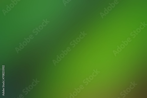 Abstract blurred background image of green colors gradient used as an illustration. Designing posters or advertisements.