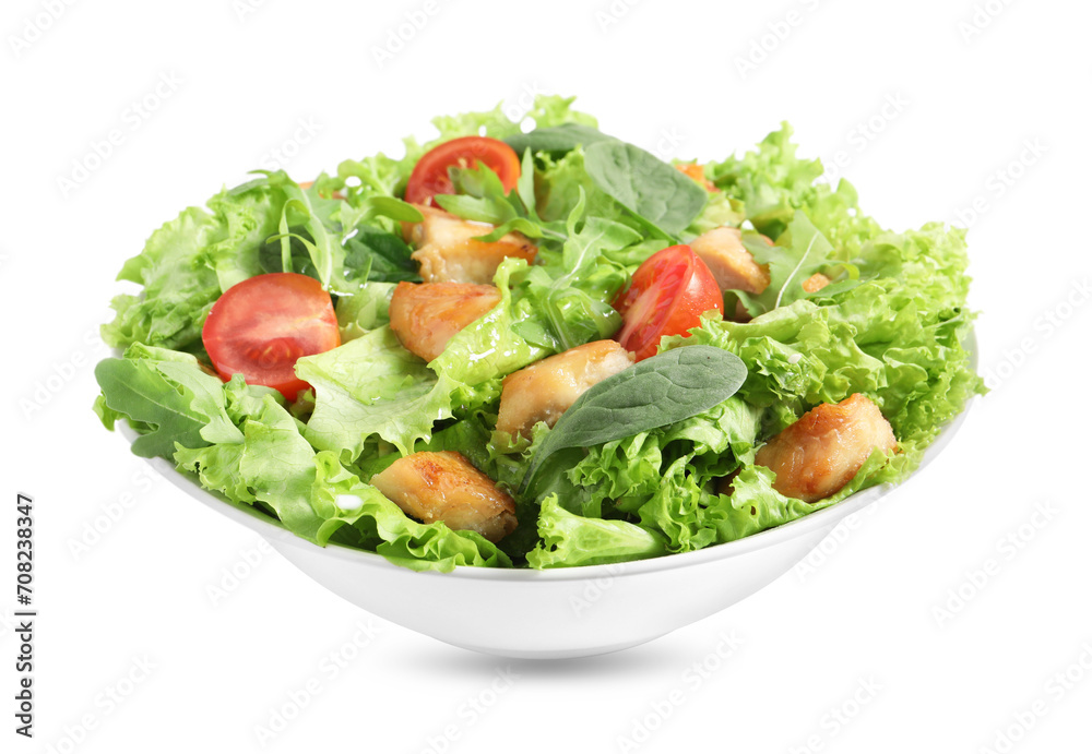 Delicious salad with chicken, cherry tomato and spinach isolated on white