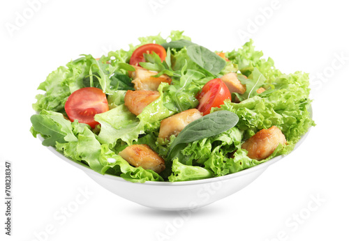 Delicious salad with chicken, cherry tomato and spinach isolated on white