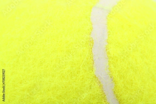 One tennis ball as background, closeup view © New Africa