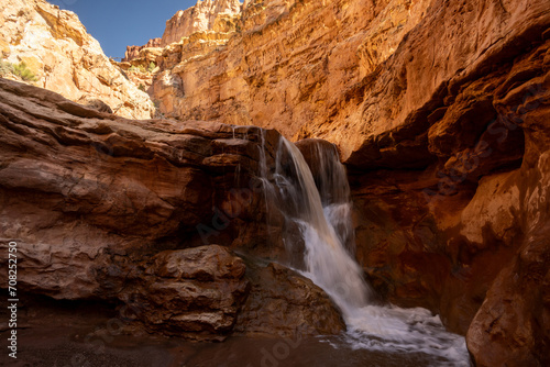 Delicate Streams Of Sulfur Creek Water Drop Into Churning Pool