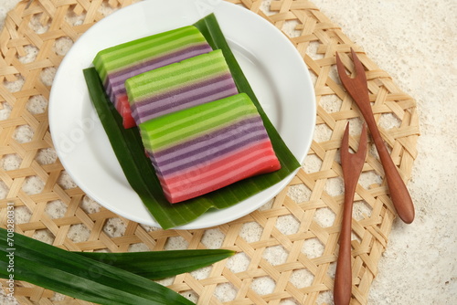 Kue Lapis Pepe or Rainbow Sticky Layer Cake is Indonesian Traditional Dessert made from Rice Flour and Coconut Milk,Steamed Layer by Layer. photo