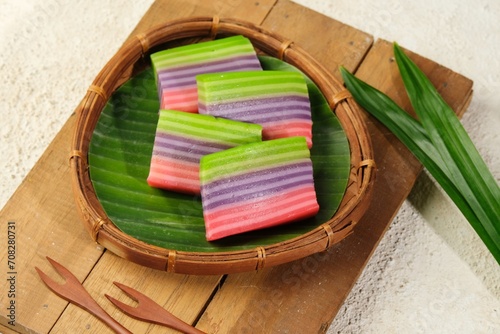 Kue Lapis Pepe or Rainbow Sticky Layer Cake is Indonesian Traditional Dessert made from Rice Flour and Coconut Milk,Steamed Layer by Layer. photo