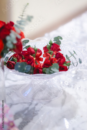 red and white flowers decoration in wedding ceremony