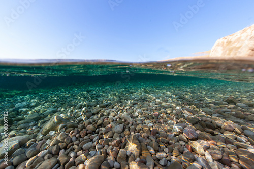 Fototapeta Naklejka Na Ścianę i Meble -  pebbles beach rocks colour depth stone underwater uw river sand minorca balear island spain wonderful crisp sharp