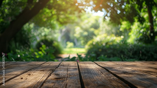 Wooden Table with a Blurry Garden Background in Morning Light