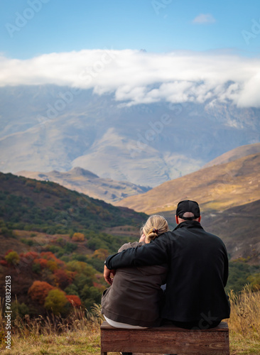 Couple in love enjoying mountain scenery