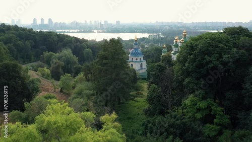 Aerial panoramic view of Vydubychi monastery and Dnipro river in Kiev, Ukraine. View from Hryshko National Botanical garden. photo