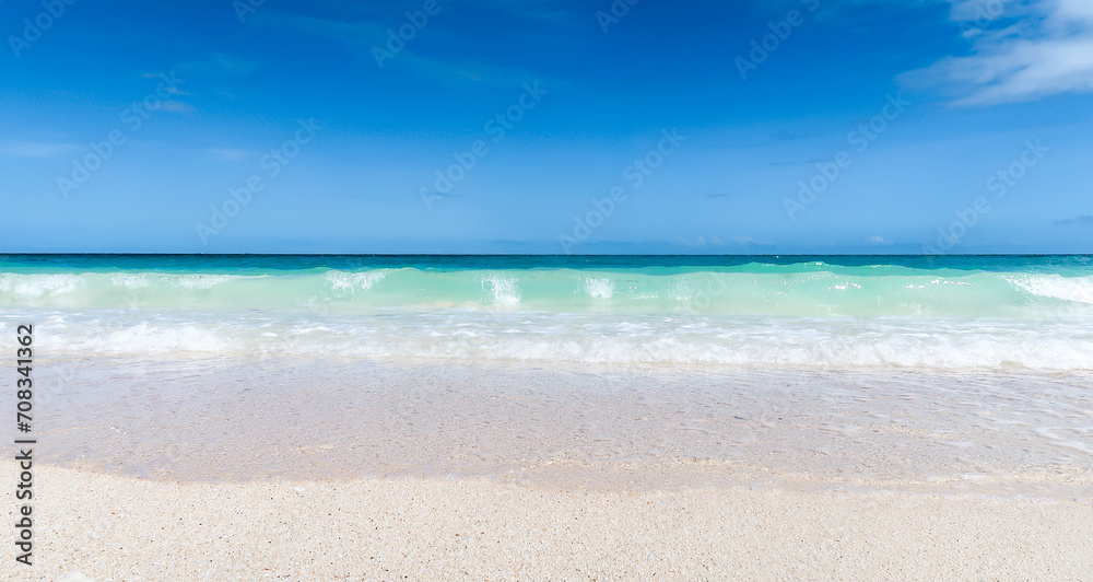 Waves turquoise sea white sand on paradise island Boracay Philippines