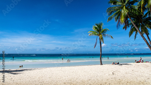 Fototapeta Naklejka Na Ścianę i Meble -  Coconut trees on a paradise white beach on Boracay Island Philippines 