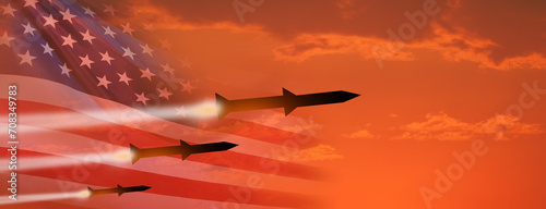Fired missiles fly to the target. USA flag. Missiles at the sky at sunset. Missile defense. Rockets attack concept. 3d illustration photo
