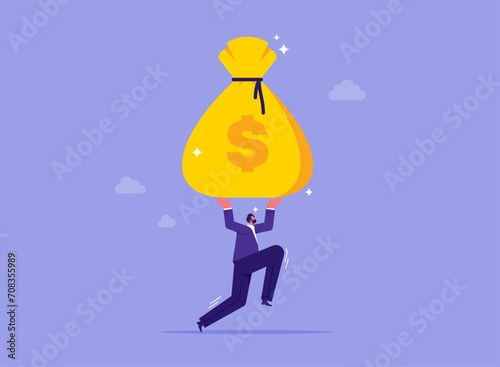 Financial success goal concept, businessman walking and carrying big heavy sack full of cash money