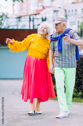 old modern couple dressing fashionable colored clothes