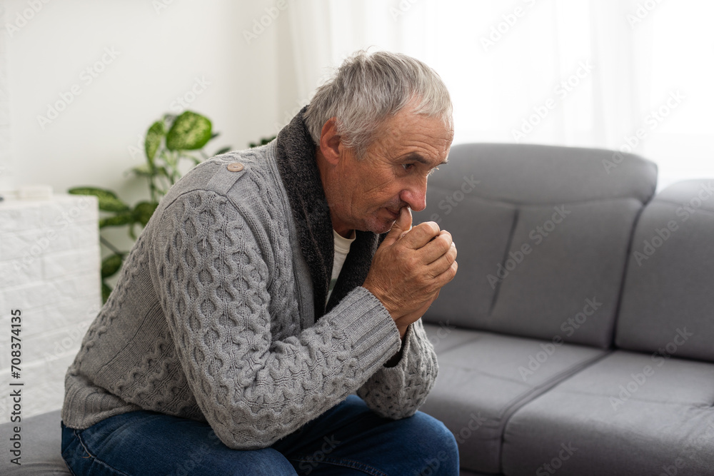Portrait praying senior man against white background Portrait praying senior man against white background