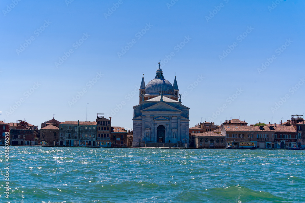 Old town of Italian City of Venice with Chiesa del Redentore church at Canale san Giorgio on a sunny summer day. Photo taken August 7th, 2023, Venice, Italy.
