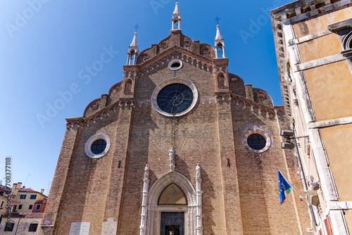 Old town of Venice with Basilica di Santa Maria Gloriosa dei Frari church on a sunny summer day. Photo taken August 7th, 2023, Venice, Italy. photo