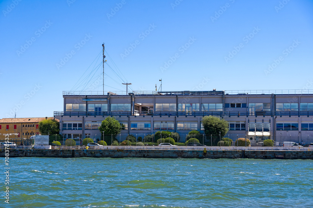 Naklejka premium Old town of Italian City of Venice with passenger terminal at port on a sunny summer day. Photo taken August 7th, 2023, Venice, Italy.