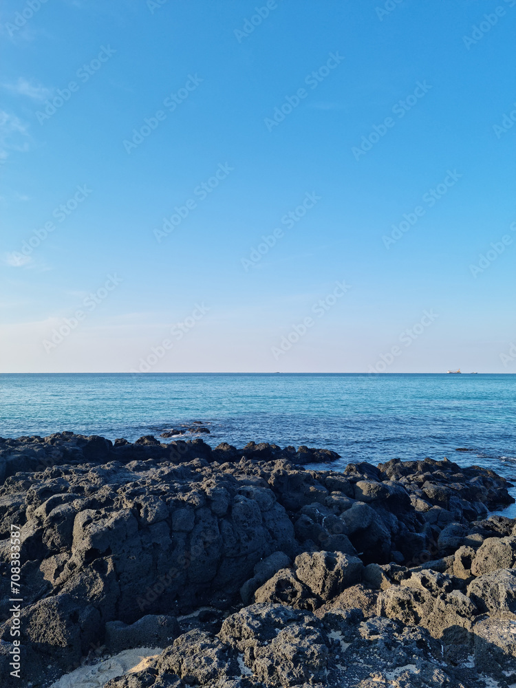 This is a Jeju seascape with basalt rocks.