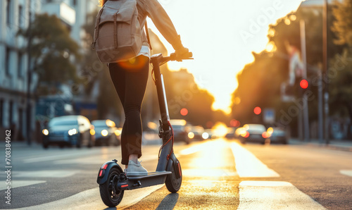 Person commuting on an eco-friendly electric scooter on a sunny urban city street, showcasing sustainable transportation and modern lifestyle photo