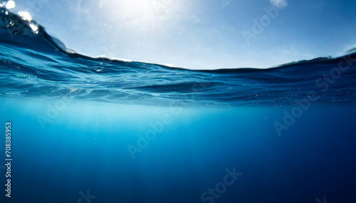Fototapeta Naklejka Na Ścianę i Meble -  Dark blue ocean surface seen from underwater