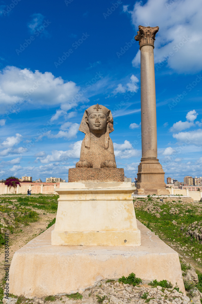 Sphinx and Pompey's pillar on territory of Serapeum of Alexandria in Egypt