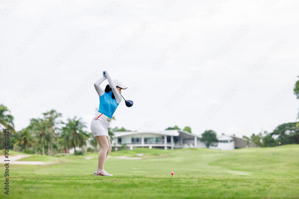 Professional woman golfer practice in golf course