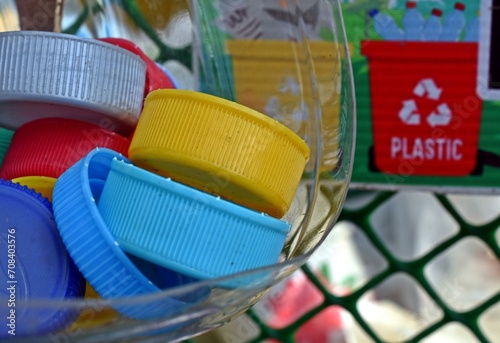 Wallpaper Mural Plastic bottle seal cap in a recycle basket Torontodigital.ca